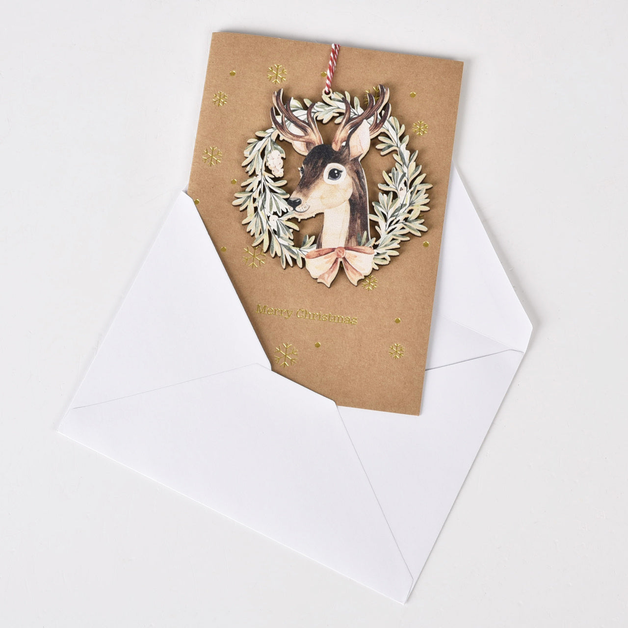 Świąteczna kartka Renifer z ozdobą kartki na Boże Narodzenie kartka na Boże Narodzenie 