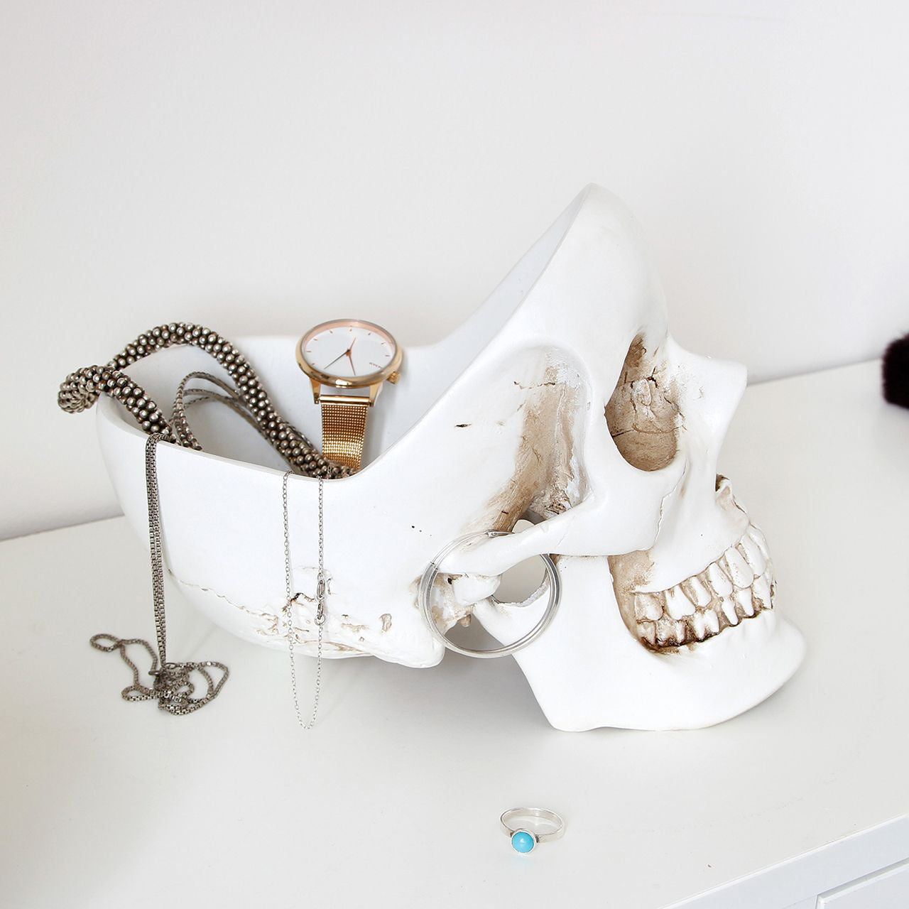 Suport căști craniu