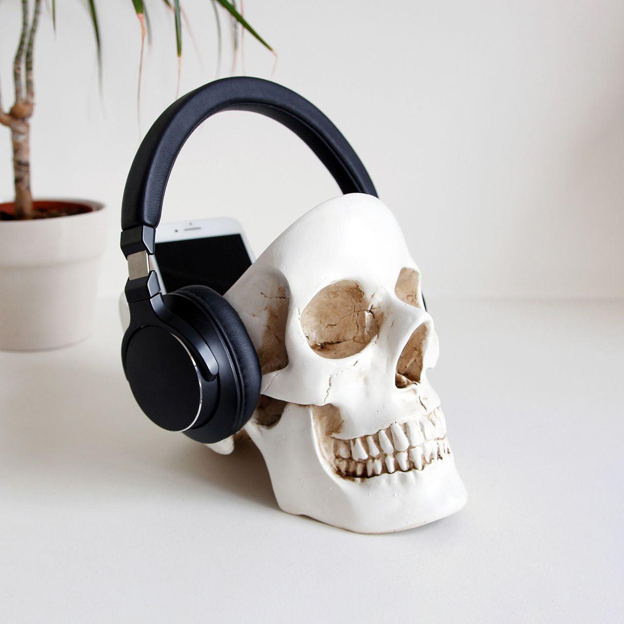 Suport căști craniu